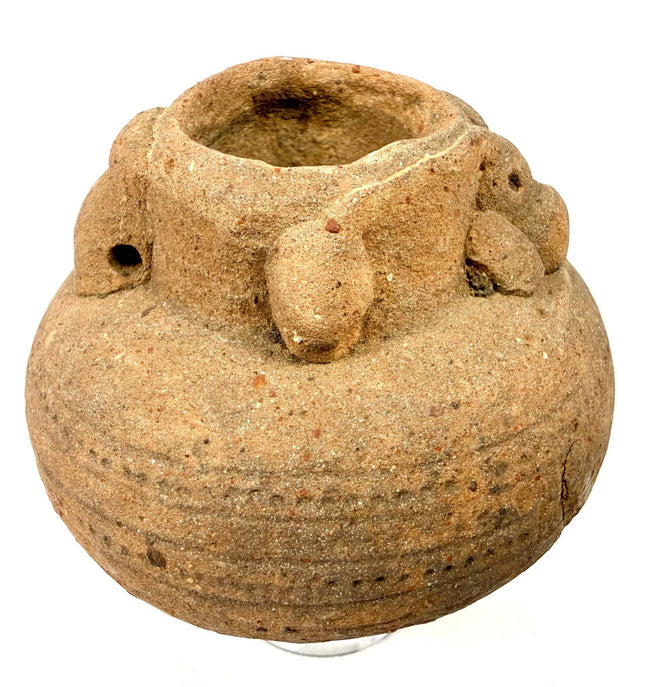Rustic ceramic pot with thick rim and three protruding knob handles