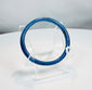 Ancient Roman glass bracelet crafted from vibrant cobalt-blue glass and preserved in complete condition.