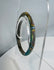 Multicolored Roman glass bracelet with fused glass bands and attractive archaeological weathering.