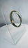 Authentic Roman mosaic glass bracelet featuring multicolored bands of green, yellow, white, blue, and black glass.