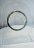 Roman Imperial mosaic glass bracelet preserved in a complete circular form with vibrant multicolored pattern.