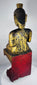 Antique Shan Buddha statue exhibiting devotional wear and historic gilded finish.