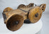 Antique Indian wooden cart with carved rosette motifs and solid wooden wheels