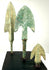 Close-up of cast bronze blade shapes with verdigris texture