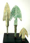 Three-piece ancient bronze arrowhead set with green patina