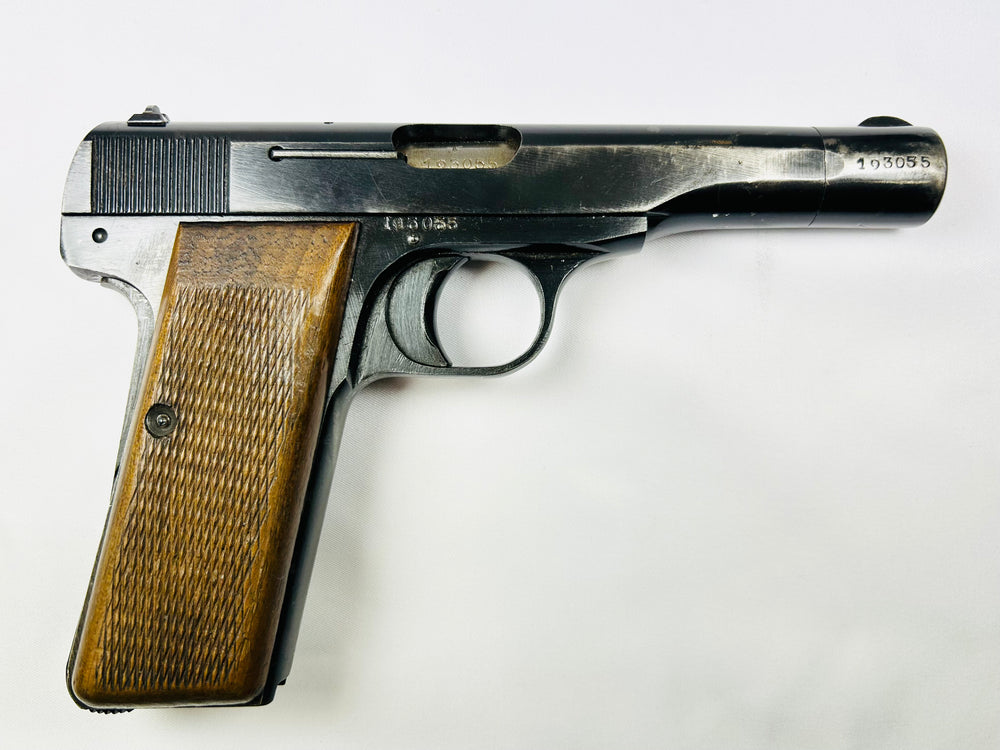 German-occupation era Browning FN 1922 pistol, WWII Belgian sidearm, photographed on white background