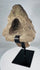 Antique African stone head fragment showing erosion, chips, and mineral accretions