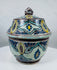 Hand-painted Moroccan glazed earthenware jar with domed lid and turquoise accents
