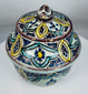 Traditional Moroccan pottery vessel showcasing hand-painted floral patterns
