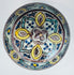 Antique Moroccan ceramic storage jar featuring floral and foliate ornamentation