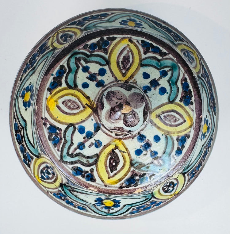 Antique Moroccan ceramic storage jar featuring floral and foliate ornamentation