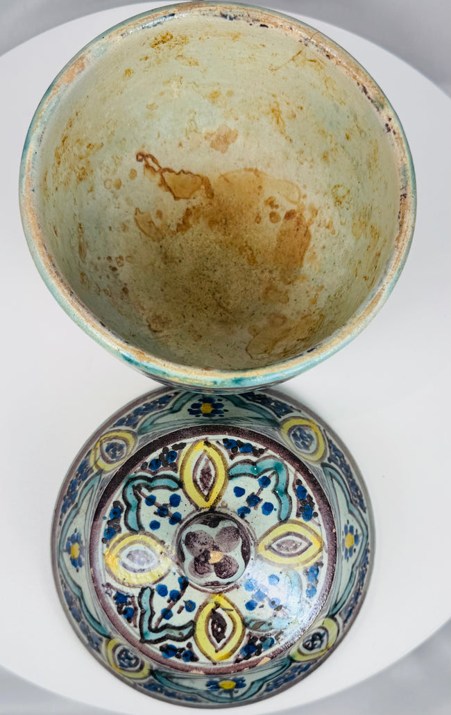 Antique North African glazed earthenware jar with painted floral cartouches