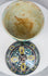 Antique North African glazed earthenware jar with painted floral cartouches