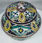 Hand-thrown Moroccan covered pottery jar with traditional Islamic design motifs