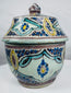 Traditional Fes pottery covered jar with polychrome Islamic floral motifs