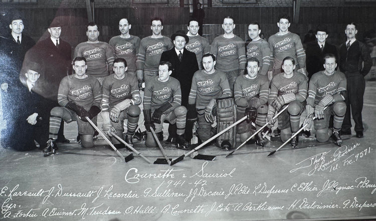 Historic Montreal hockey team portrait showing players in Couvrette & Sauriol sweaters