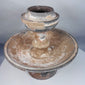 Rare ancient ceremonial pottery stand displaying centuries of burial deposits