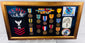 United States Navy veteran memorial display with photograph, awards, and embroidered emblems
