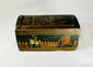 Side view of a 19th-century Indian Ganjifa wooden box featuring hand-painted royal procession and hunting motifs, on a white background.