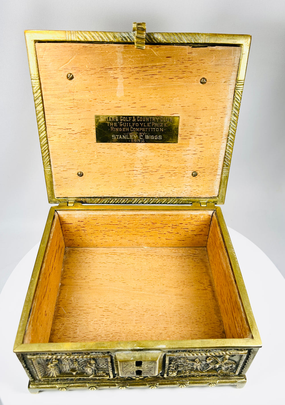 Decorative bronze box with courtly scenes and ornate Renaissance motifs