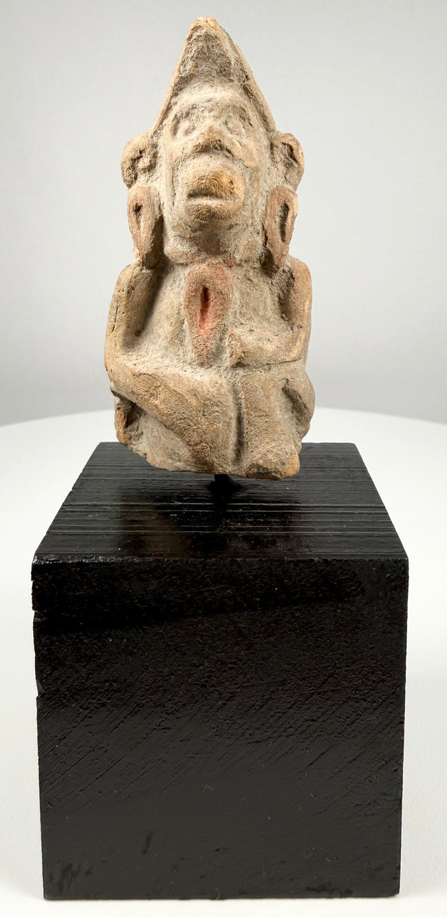 Ancient Indian terracotta devotional figurine dating to the 3rd–6th century CE, featuring stylized facial features and an elongated headdress.