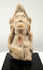 Early Historic Indian terracotta figure depicting a possible deity or devotee, crafted from reddish baked clay with natural earthen accretions.