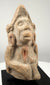 Ancient South Asian terracotta fragment representing a possible deity or worshipper, with weathered facial details and minor surface chipping.