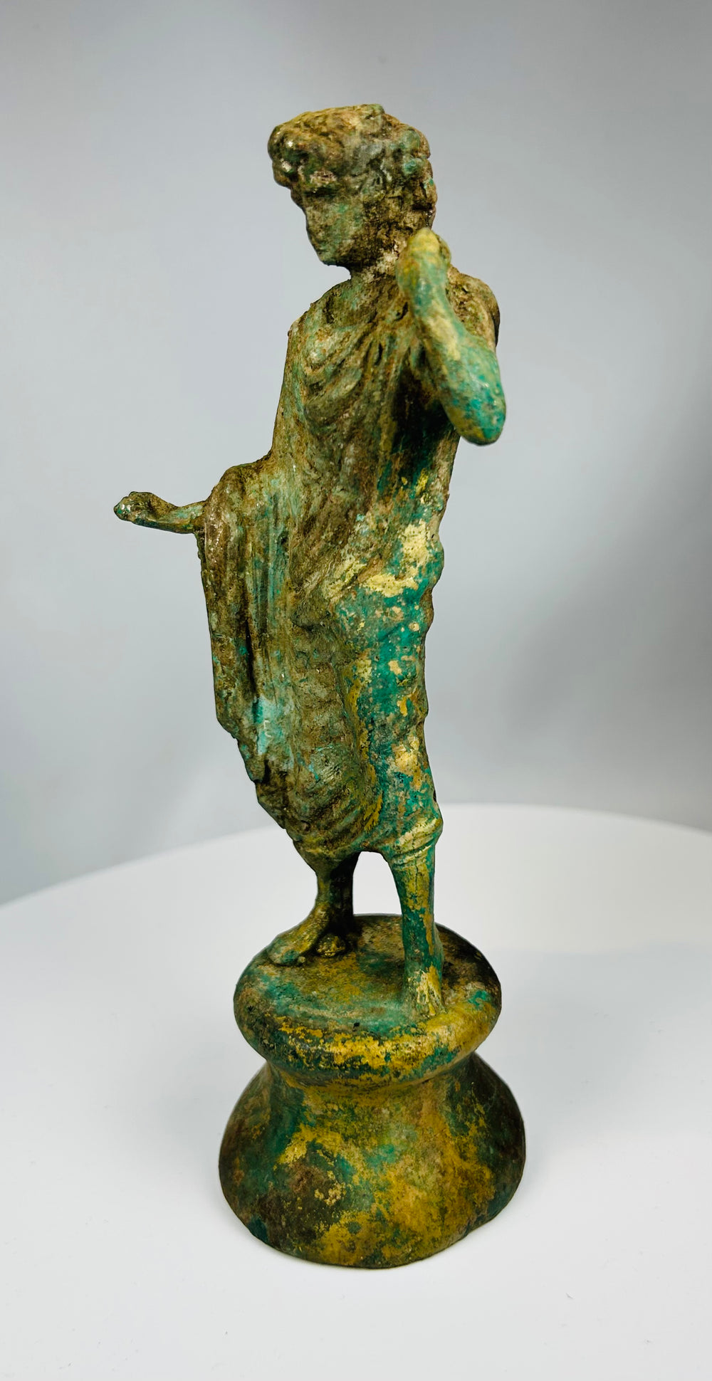 European bronze figural sculpture with verdigris and draped form