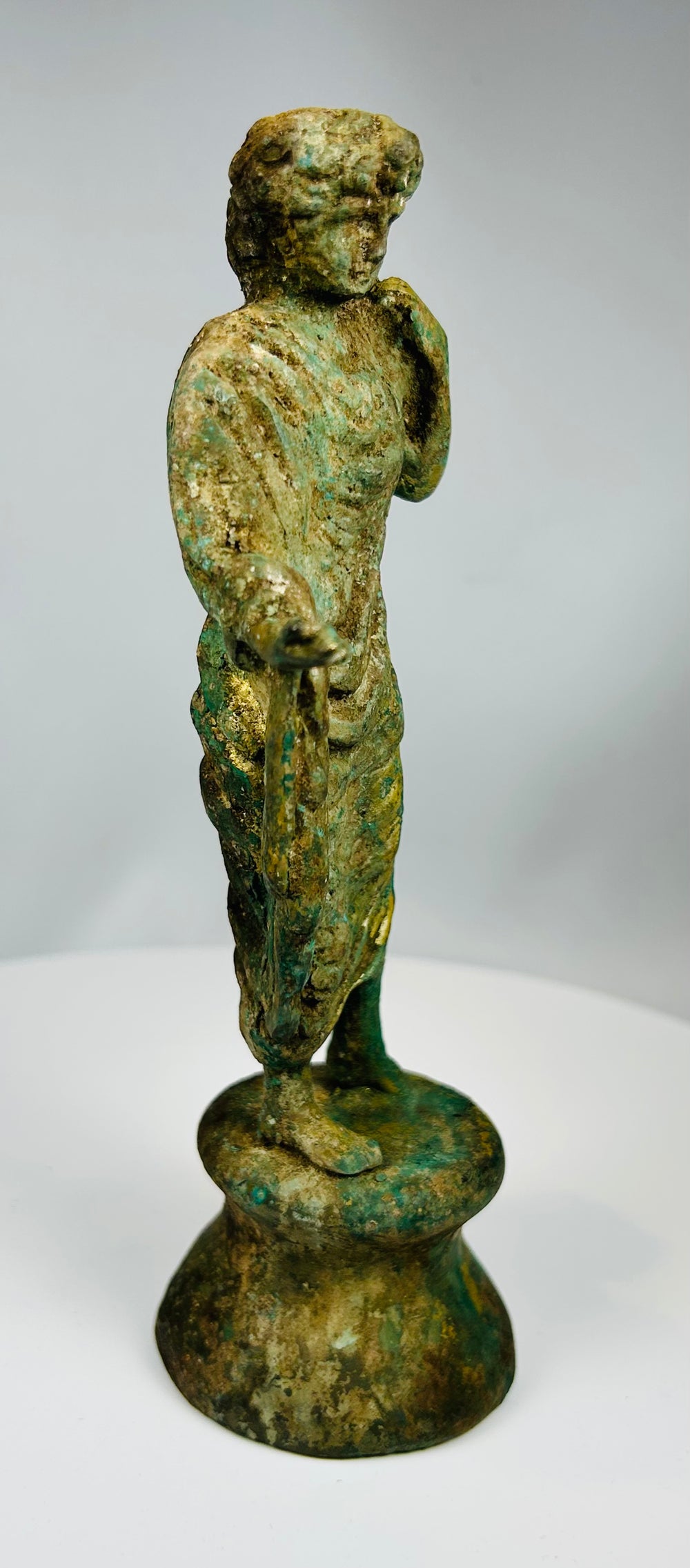 European cast bronze statue with detailed robes and aged finish