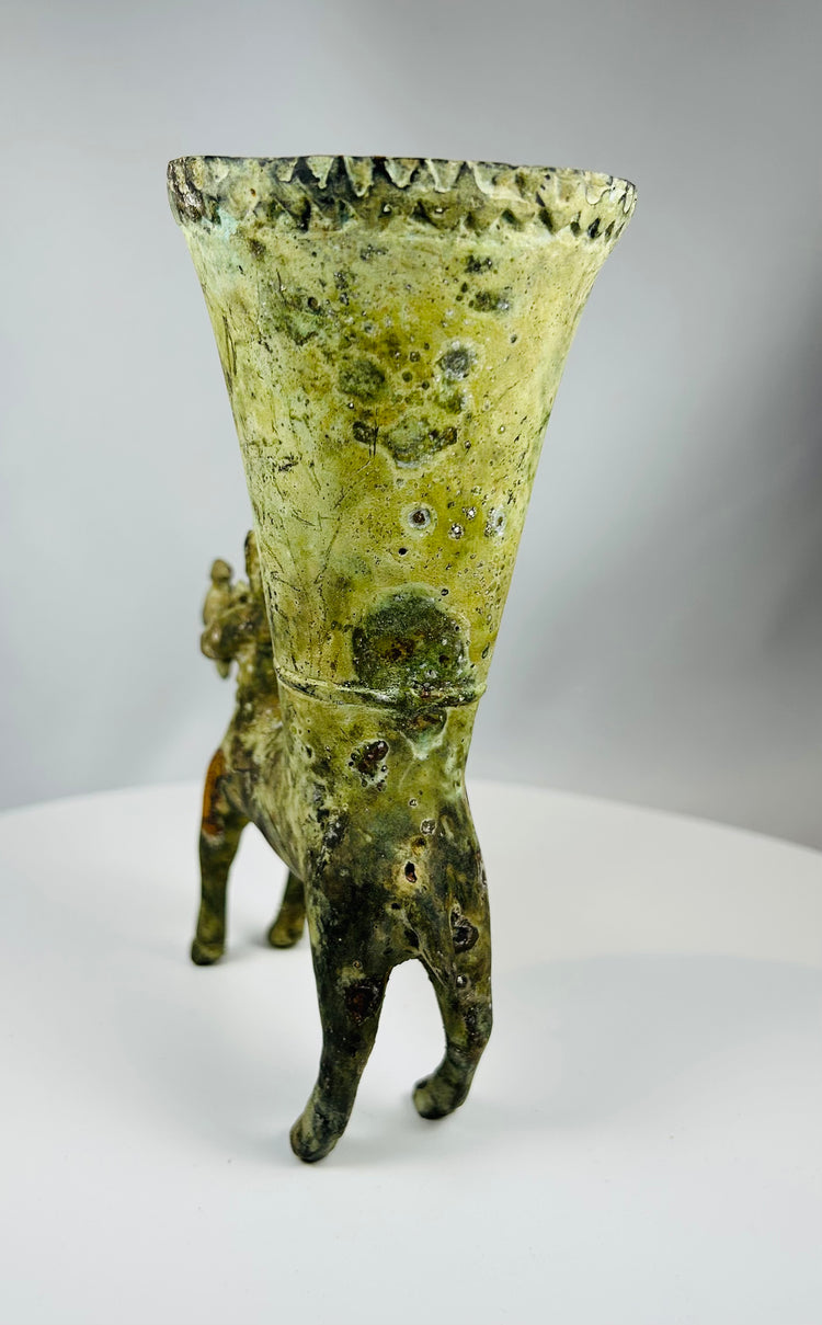 Bronze centaur figure holding goat atop sculptural rhyton vessel