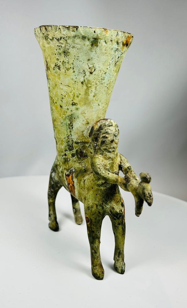 European cast bronze vessel with centaur and four legged base