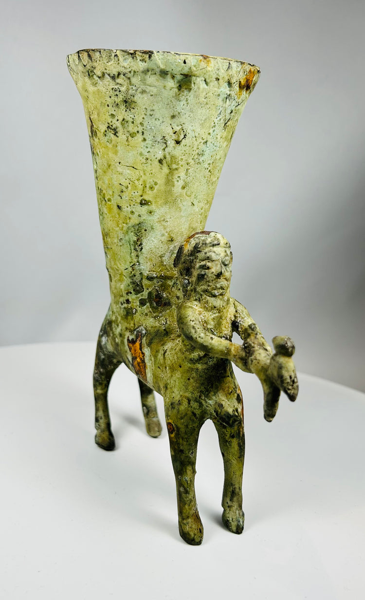 European cast bronze vessel with centaur and four legged base