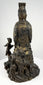 Rear view of antique bronze Bodhisattva crown and geometric robe detailing