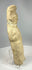 Near Eastern earthenware figurine with folded arms and headdress