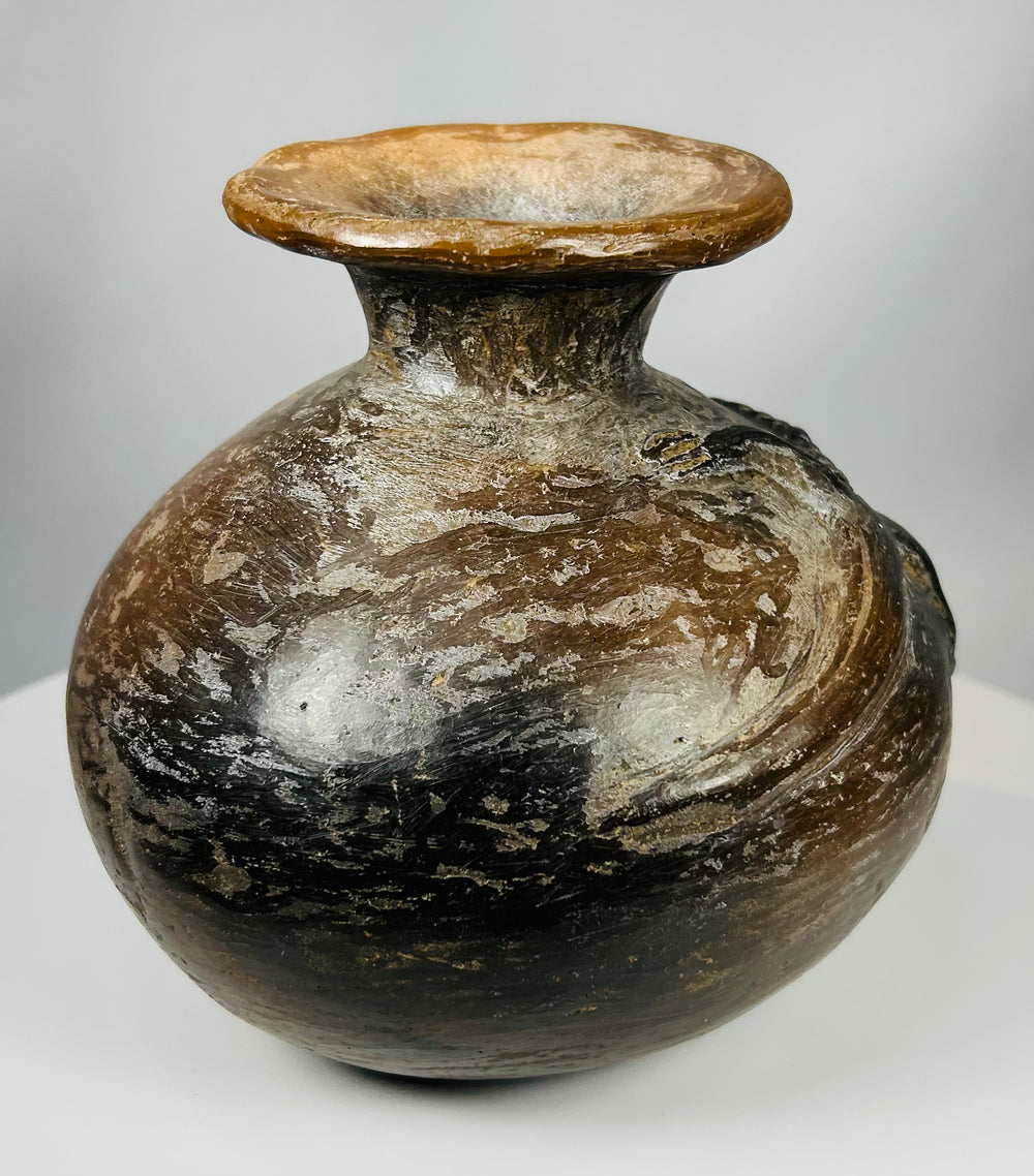 Nicoya terracotta vessel with incised geometric band and patina