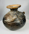 Ancient Costa Rica pottery vessel with reptile imagery and aged surface