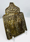 Cast bronze Russian Orthodox icon panel with geometric borders, religious figures, and aged dark patina.