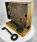 Antique box lock with visible lever mechanism and aged patina