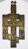 Antique bronze Orthodox cross from Russia displaying detailed religious imagery and devotional craftsmanship.