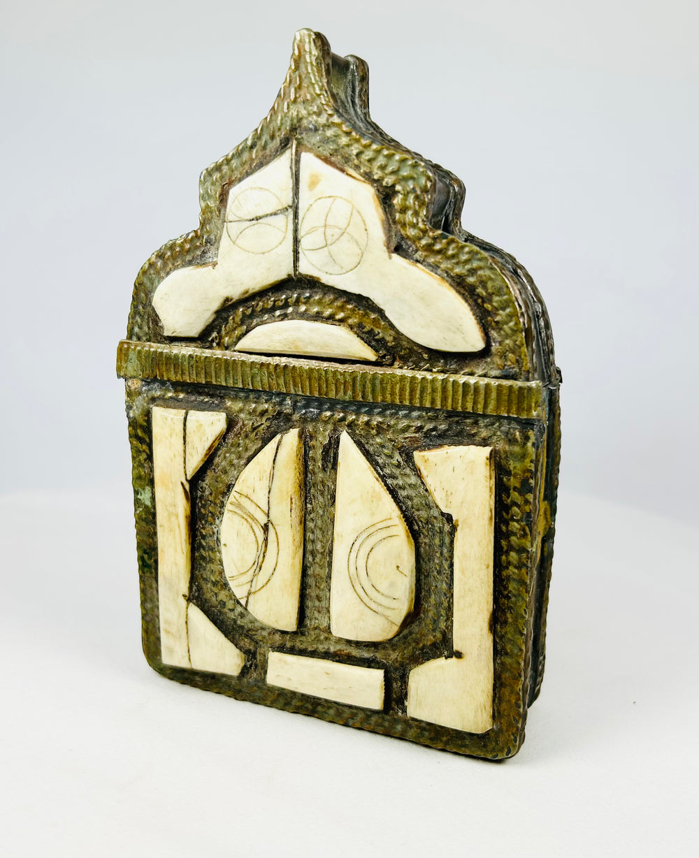 Antique Berber brass amulet box with incised bone panels and geometric motifs, 19th century Morocco.