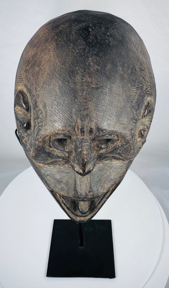 Early 20th-century Fatuleu Village mask displaying traditional Timorese tribal craftsmanship and spiritual symbolism.