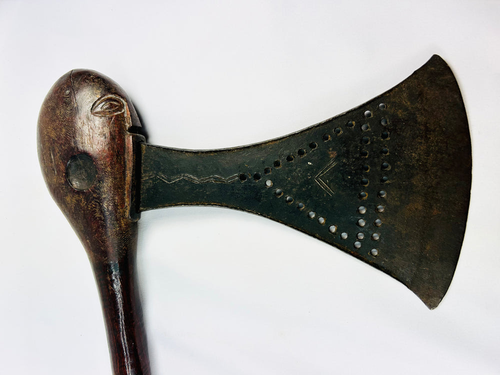 Late 19th century Luba regalia axe with triangular punchwork and symbolic eye motif