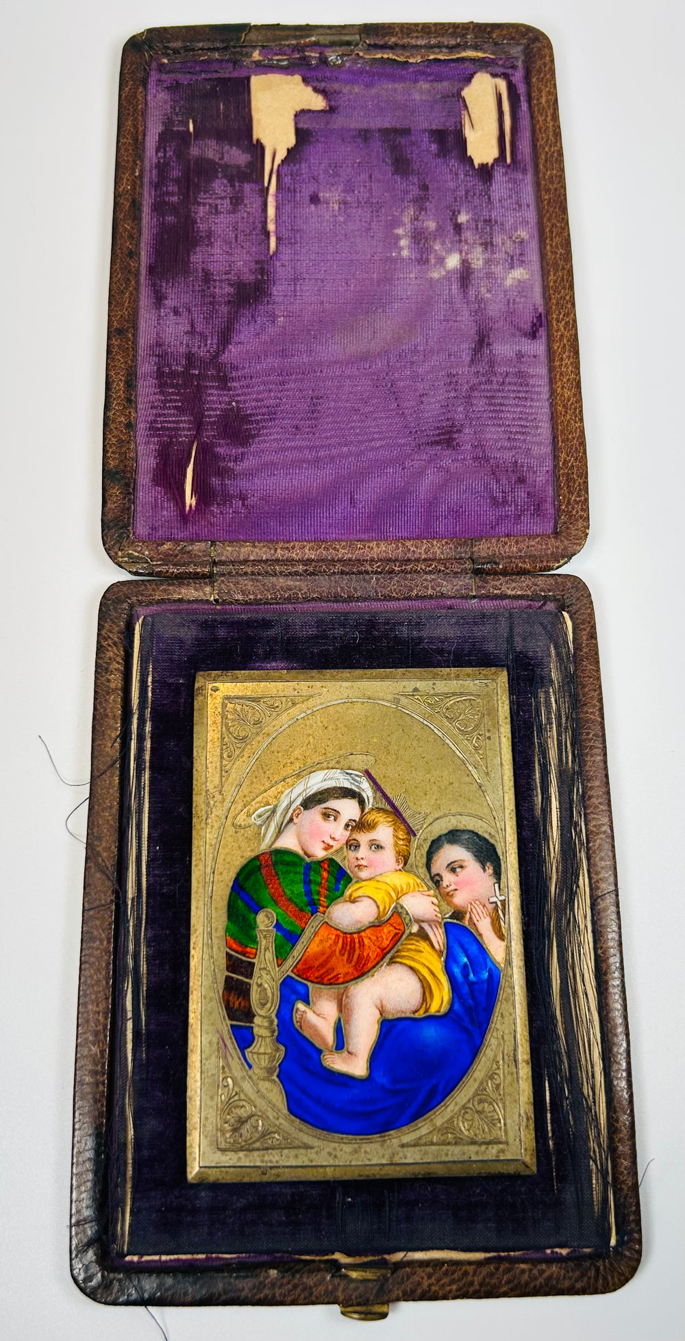 Portable devotional icon with enamel painting and velvet-lined case