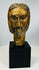 Carved wooden Christ head with expressive facial features