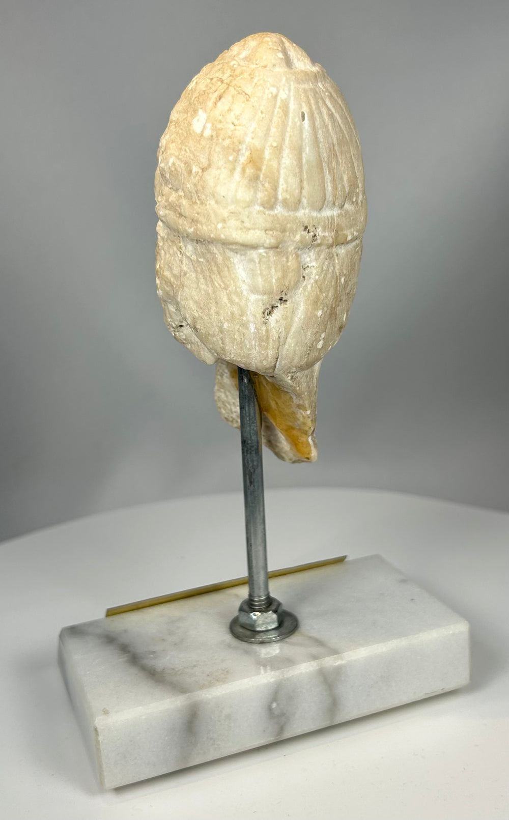 Ancient carved stone head from Assyria with burial patina