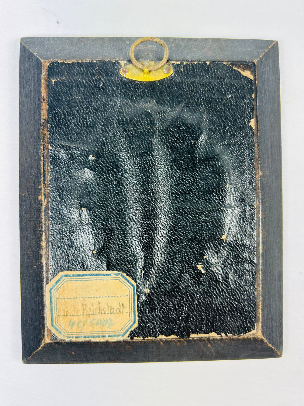 Central European Napoleonic portrait miniature, mid–late 1800s, finely painted military likeness in ebonized dish frame with aged patina.