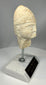 Ancient Mesopotamian alabaster sculpture with stylized expression