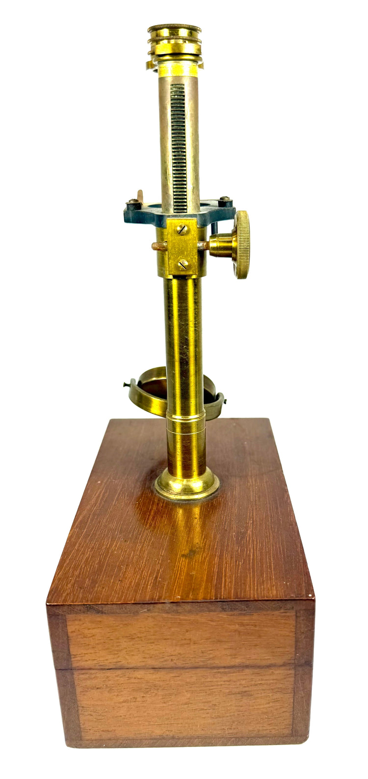 Victorian microscope storage case retaining its original fitted wooden supports and aged red textile interior lining.