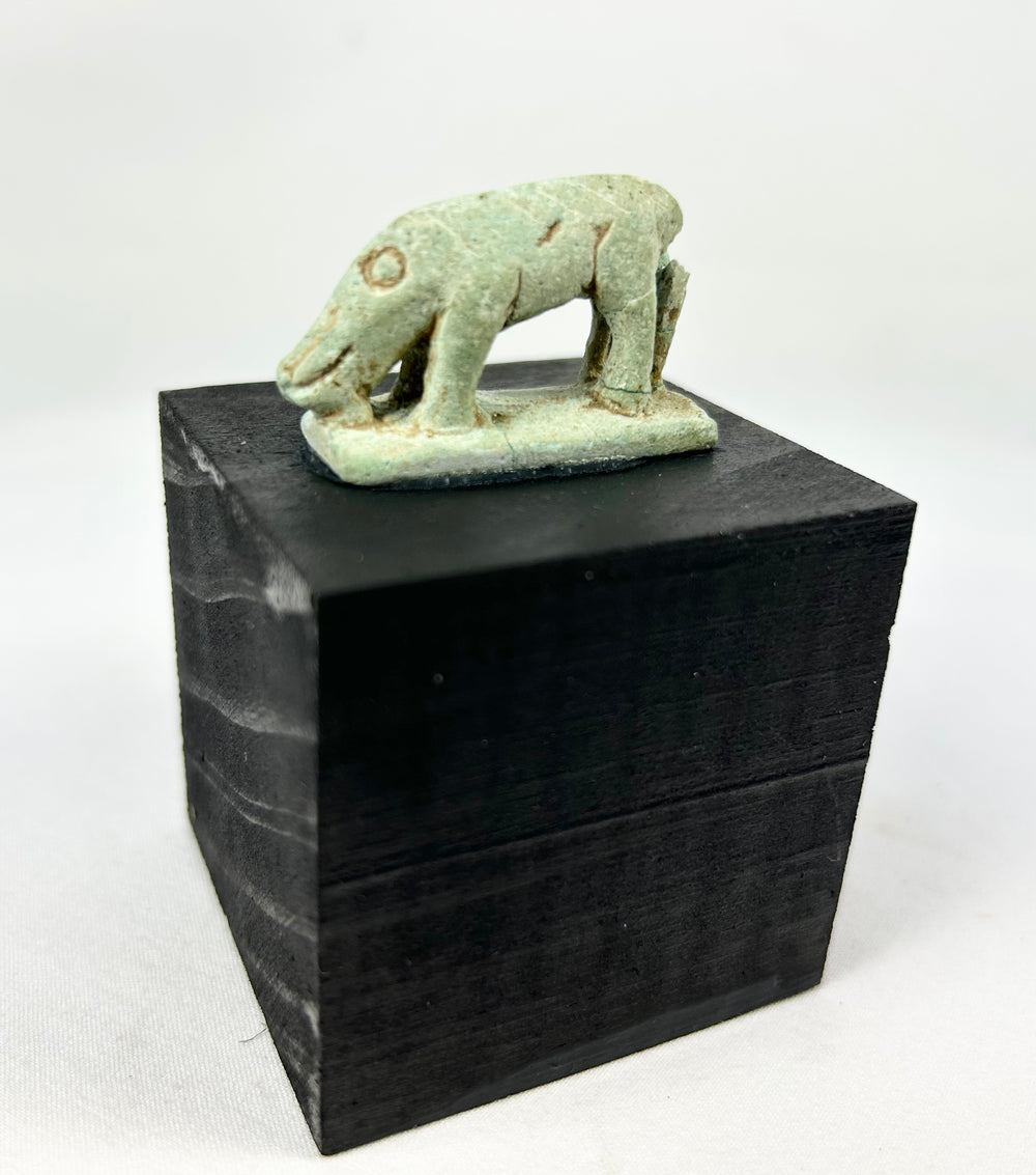 Late Period Egyptian shrew amulet in green faience, elongated snout and ring-and-dot eye, circa 664–30 BCE.