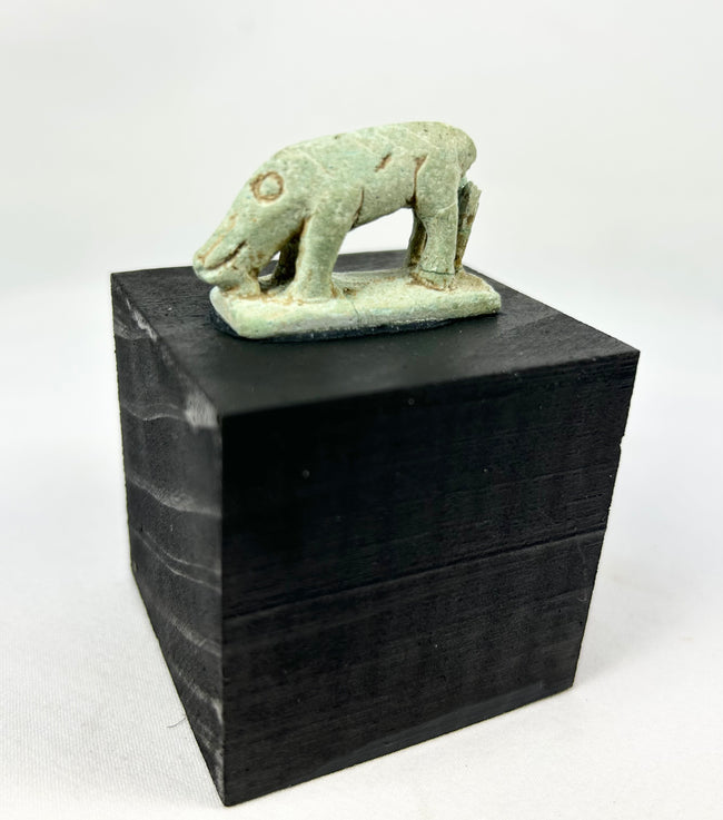 Late Period Egyptian shrew amulet in green faience, elongated snout and ring-and-dot eye, circa 664–30 BCE.